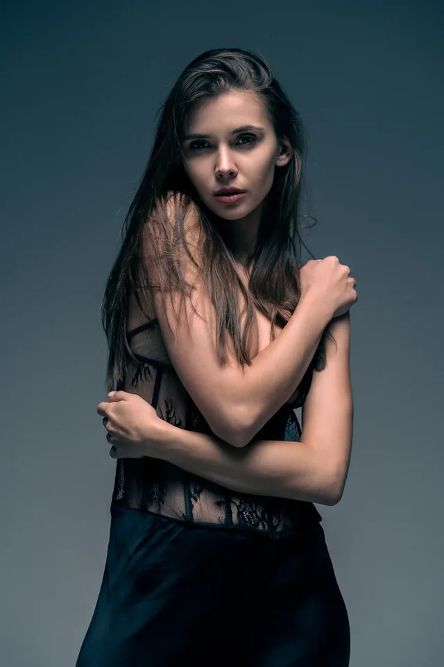 Portrait with arms crossed over the chest.
